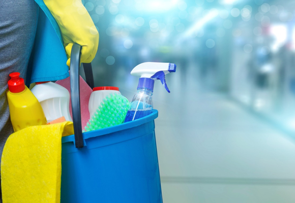 Cleaning supplies in a bucket